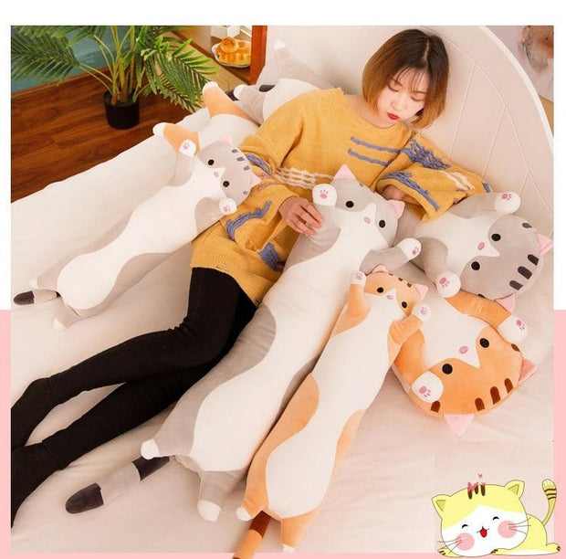 Cat Plush Toys On Bed